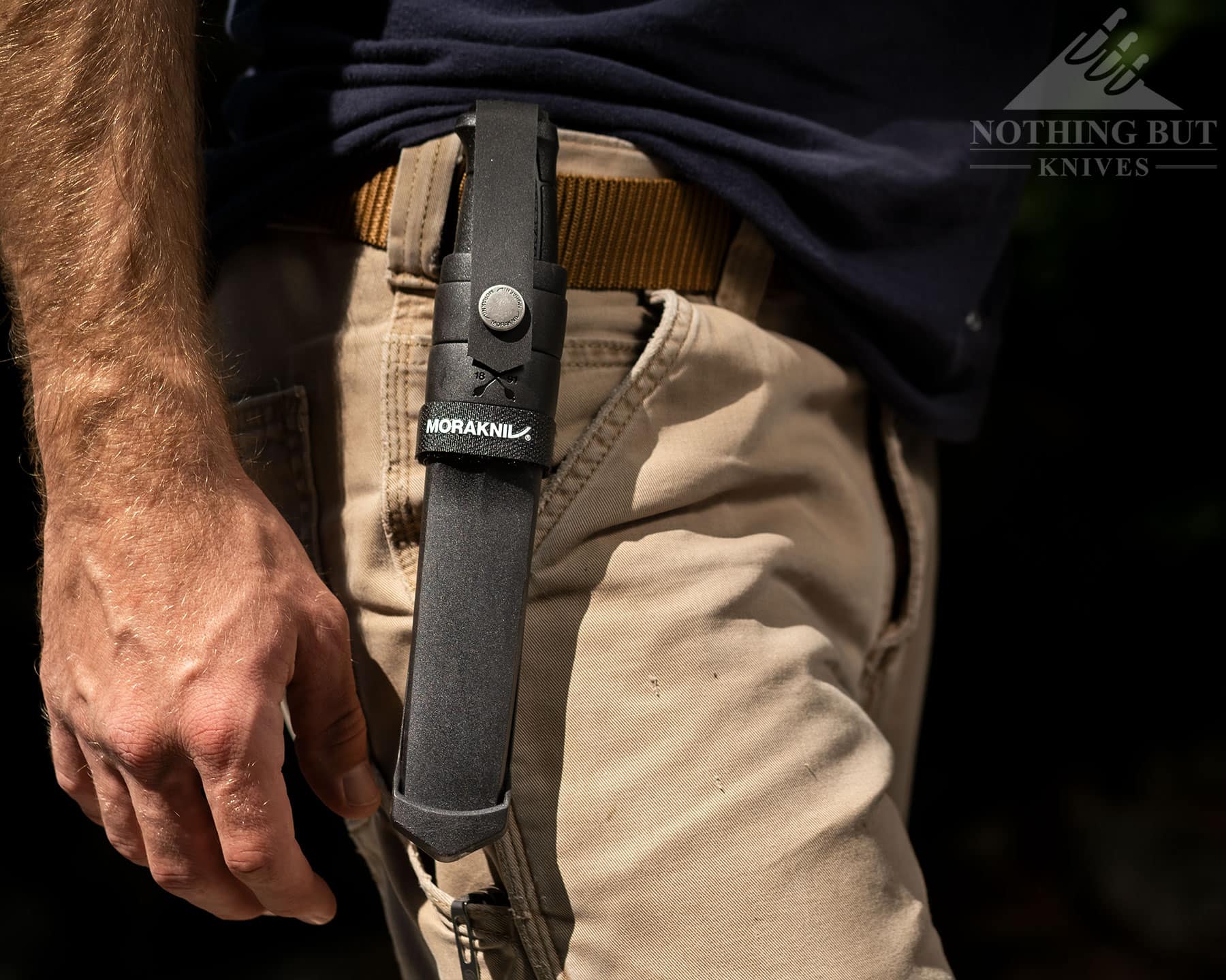 Morakniv Garberg Review - Image 8 The Garberg riding on the belt in its button-strap sheath.