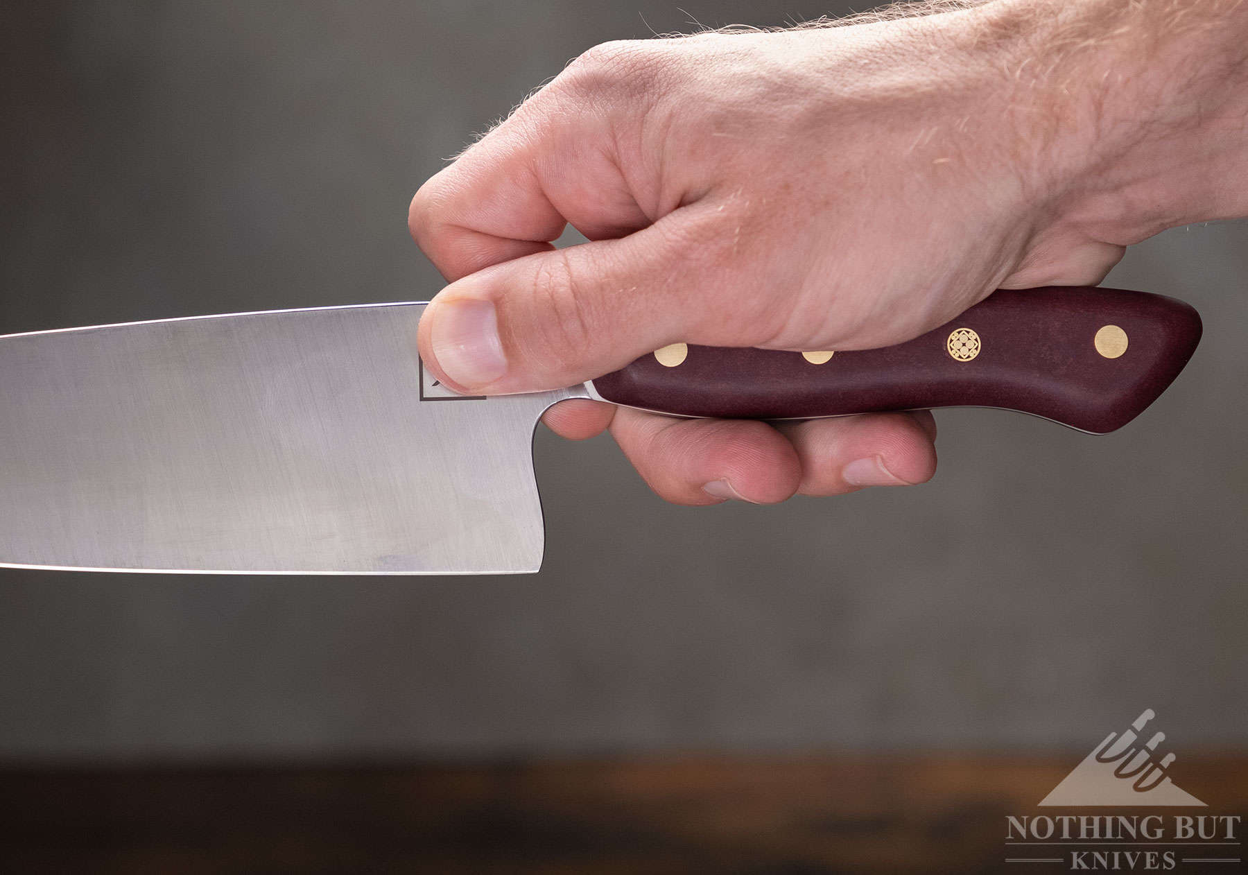 The Artisan Revere chef knife is comfortable in a pinch grip. 