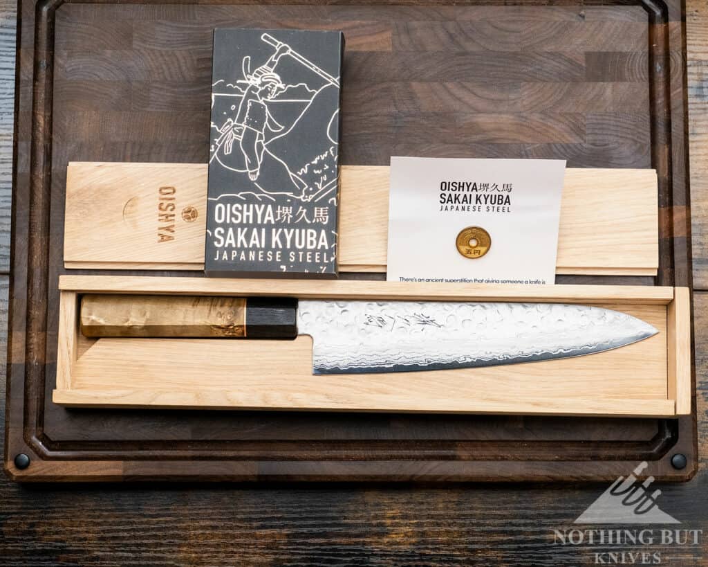 Oishya Sakai Kyuba Gyuto Chef'S Knife Review - Image 11 The Oishya Sakai Kyuba chef's knife inside the wooden gift box it ships in.