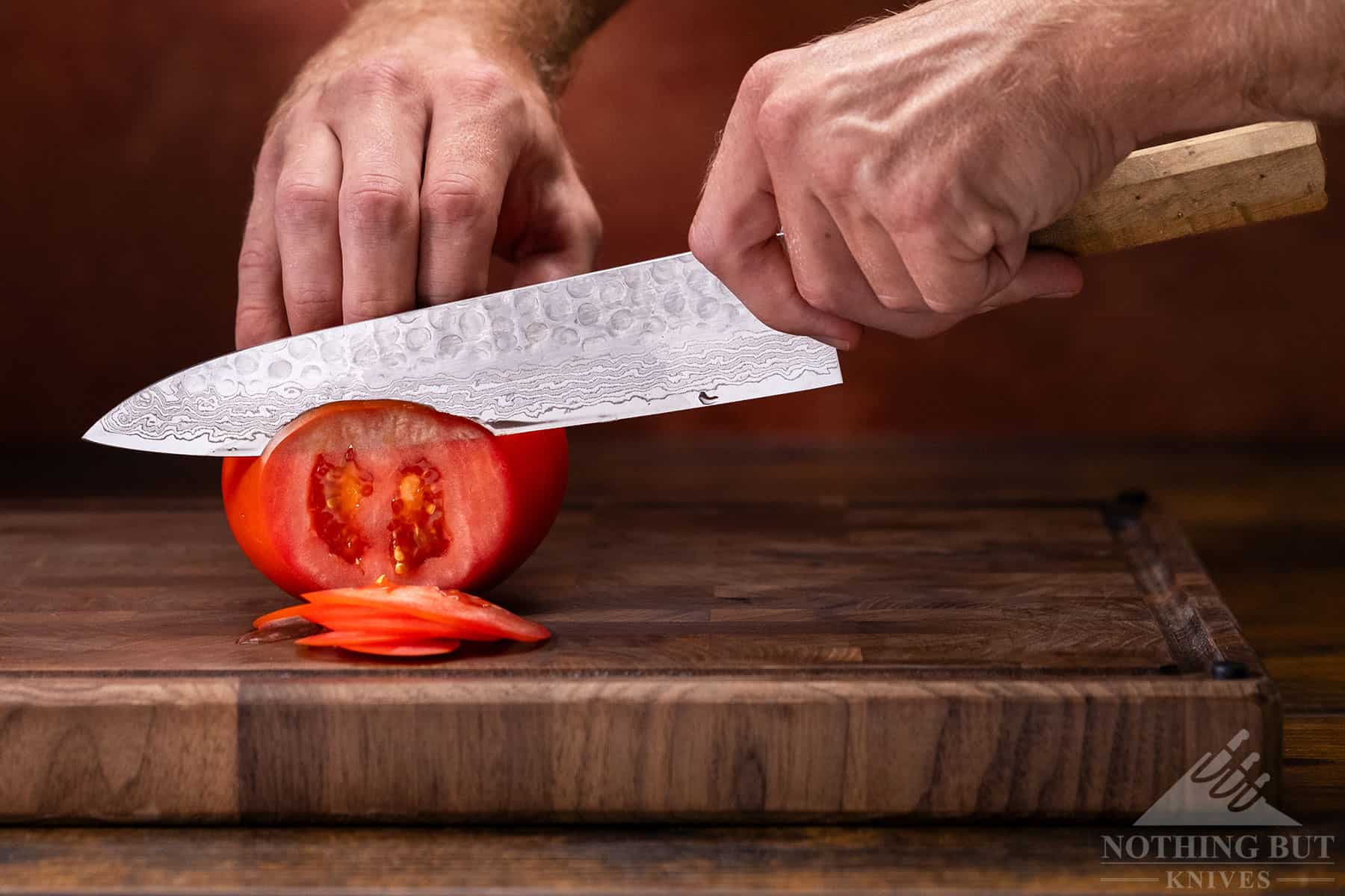 This Oishya chef knife sliced effortlessly through soft tomatoes. 