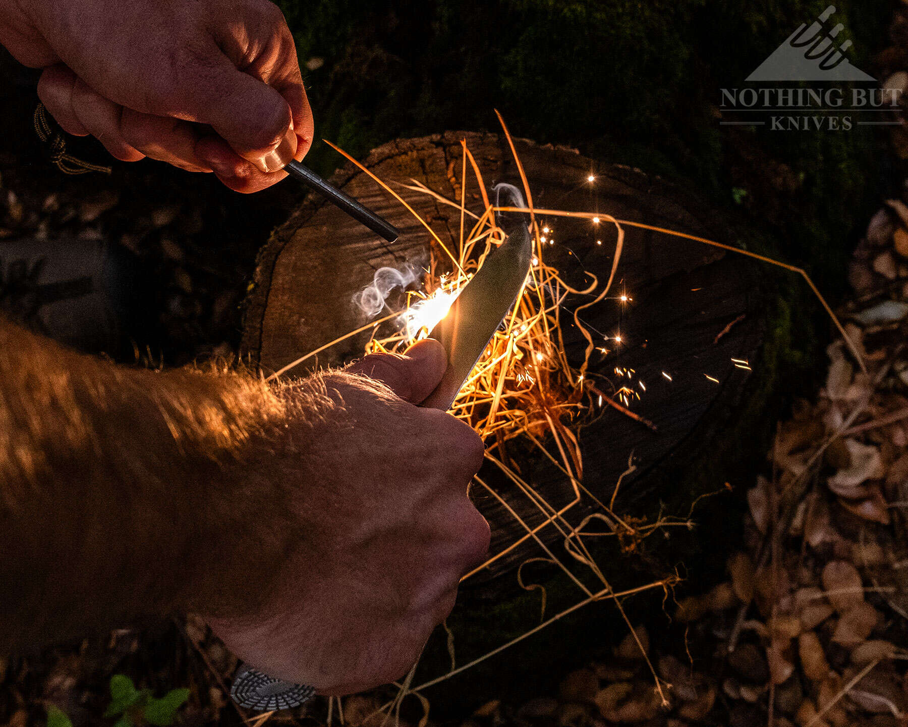 The Buck Selkirk ships with a ferro rod for throwing spark with the spine of the knife to start a fire. 