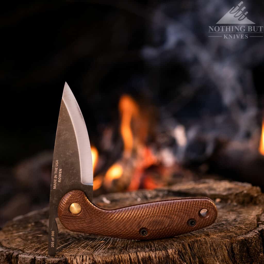 The Esee Pinhoti is a handy folding bushcraft knife to have around the campfire.