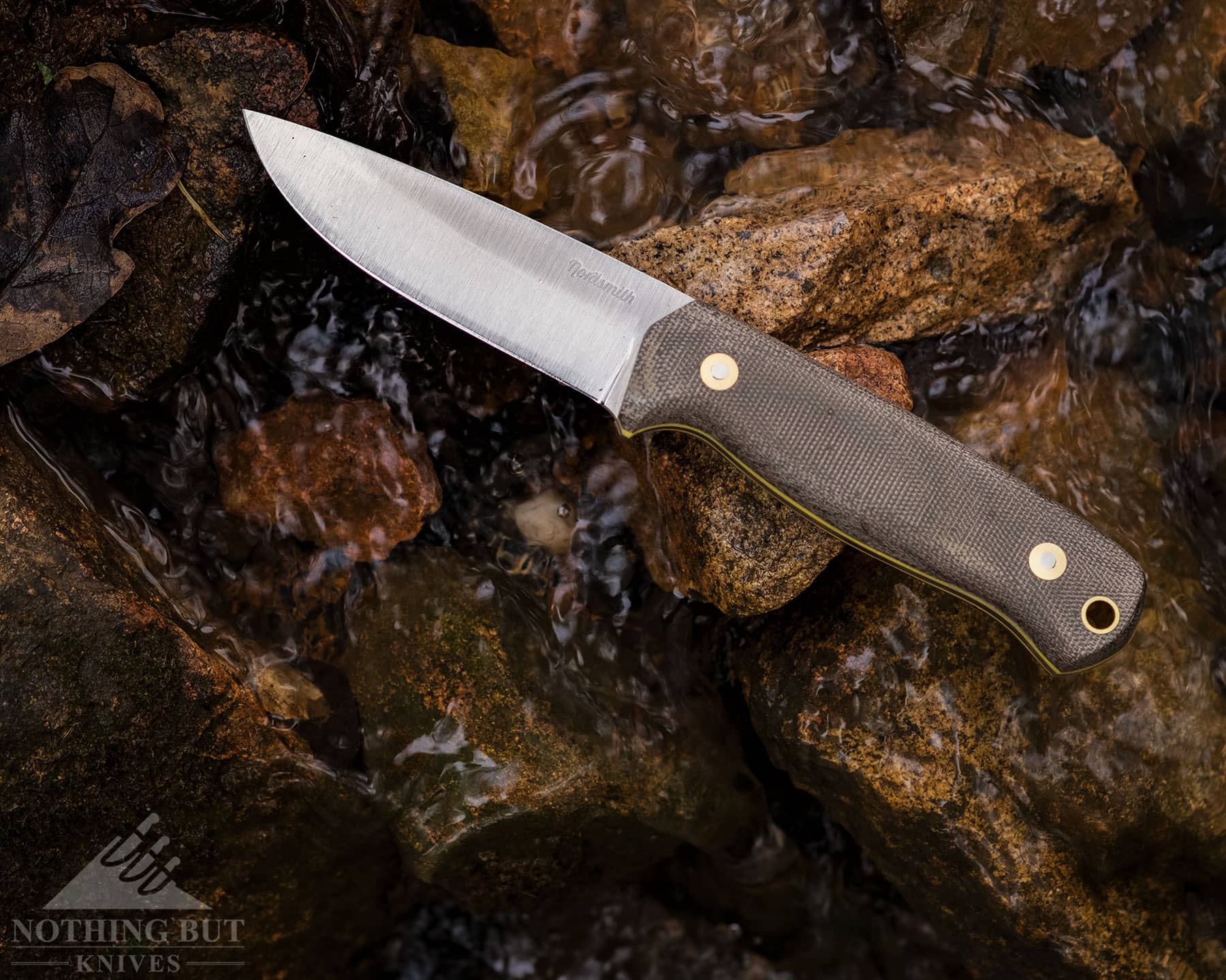 The Nordsmith Pilgrim LT has a Micarta handle and an AEB-L steel blade.