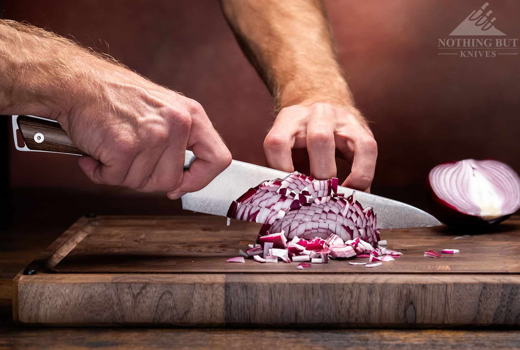 Shun Kanso Chef'S Knife Review - Image 6 Dicing a red onion with the Kanso.