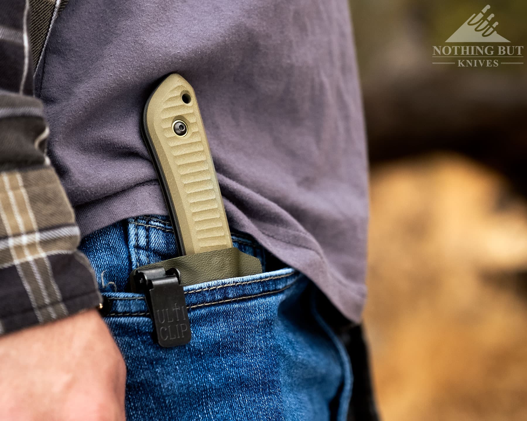 Our Favorite Fixed Blade Edc Knives And How To Carry Them - Image 23 The Overland X from Schwarz Knives shown here inside the right front pocket of a person's jeans secured with an UltiCliip.