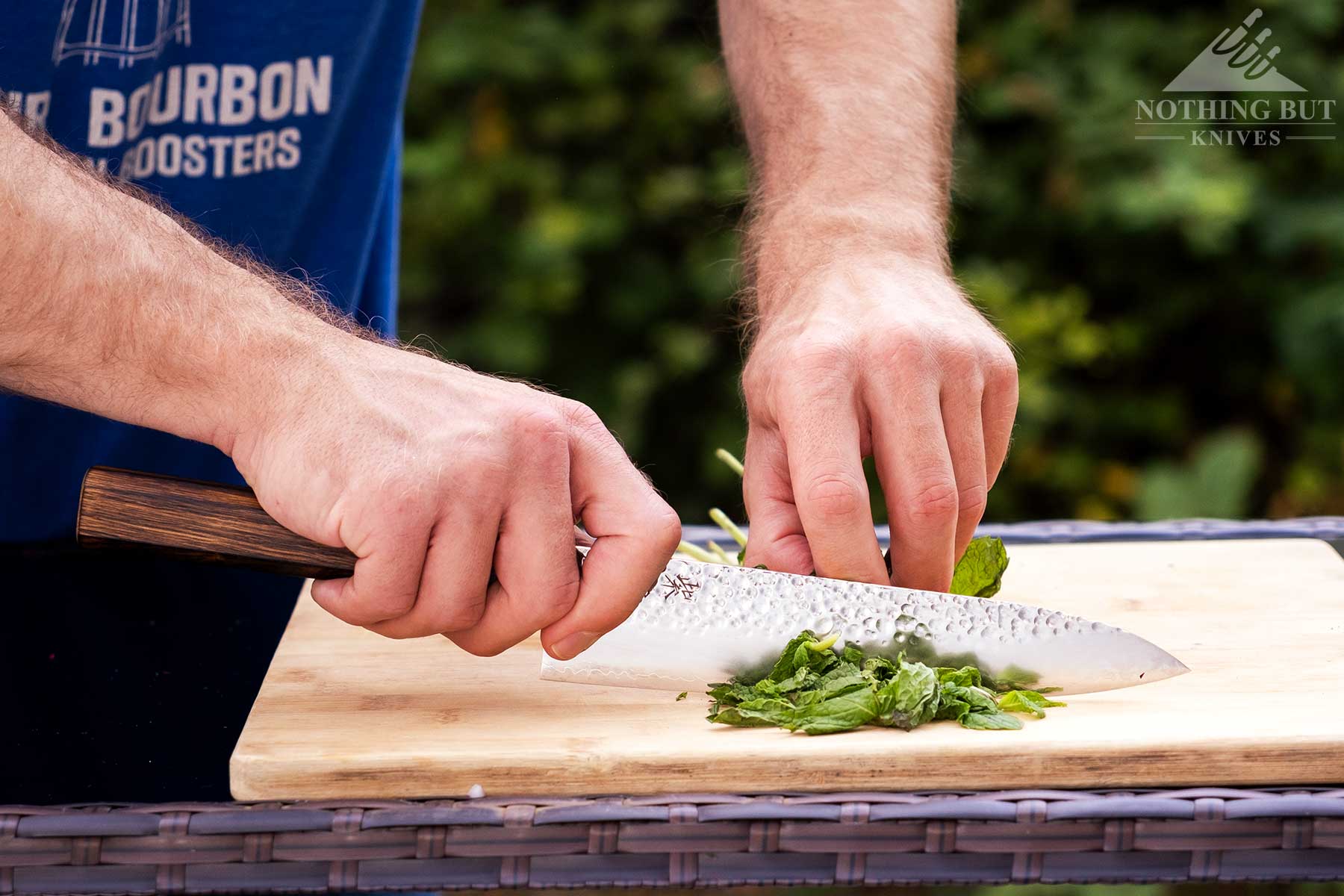 Demko Gyuto Chef Knife Review - Image 4 Herbs being diced with the Demko Gyuto Japanese style chef knife from Demko Knives.