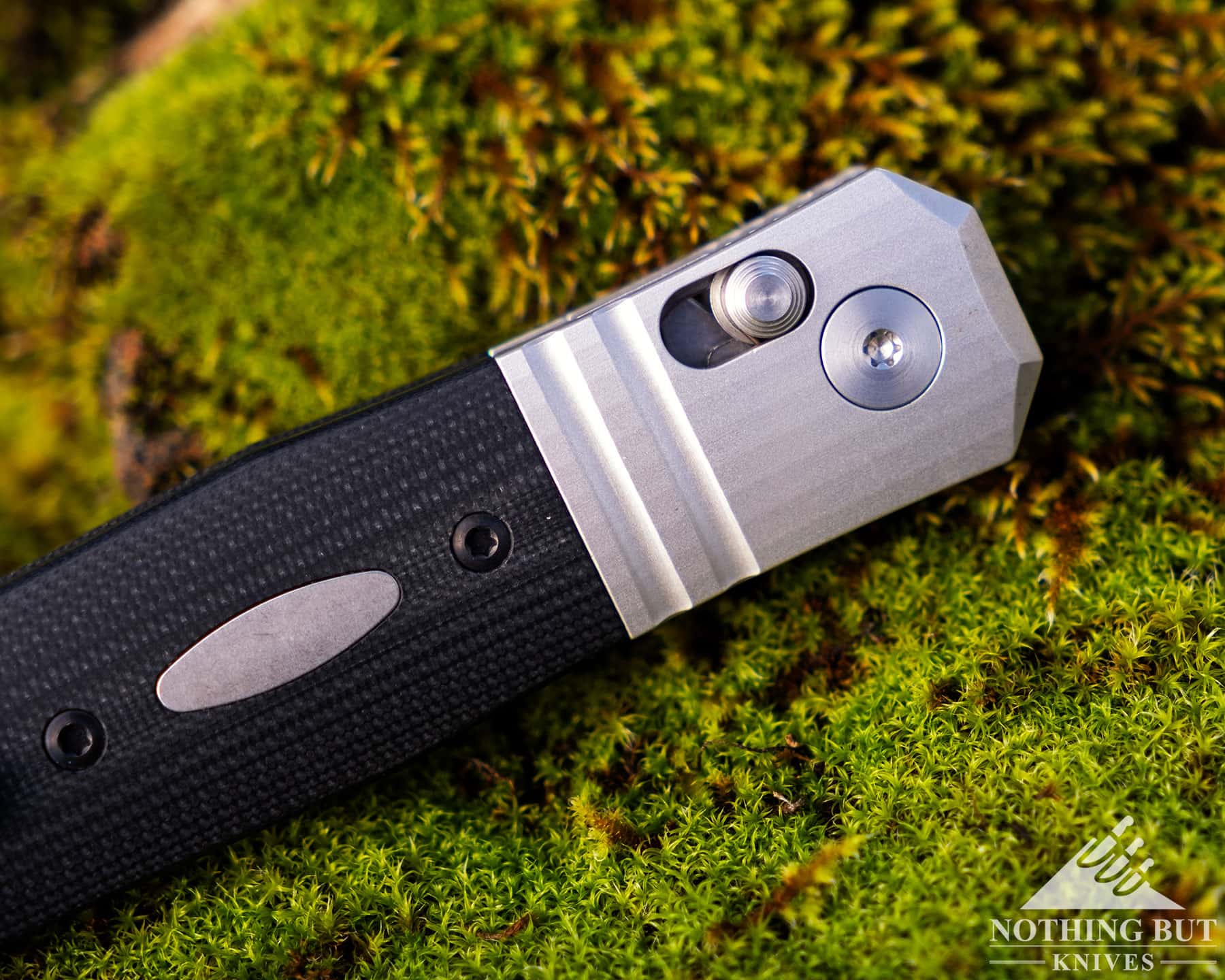 A close-up of the crossbar lock on the CRKT Redemption folding knife.