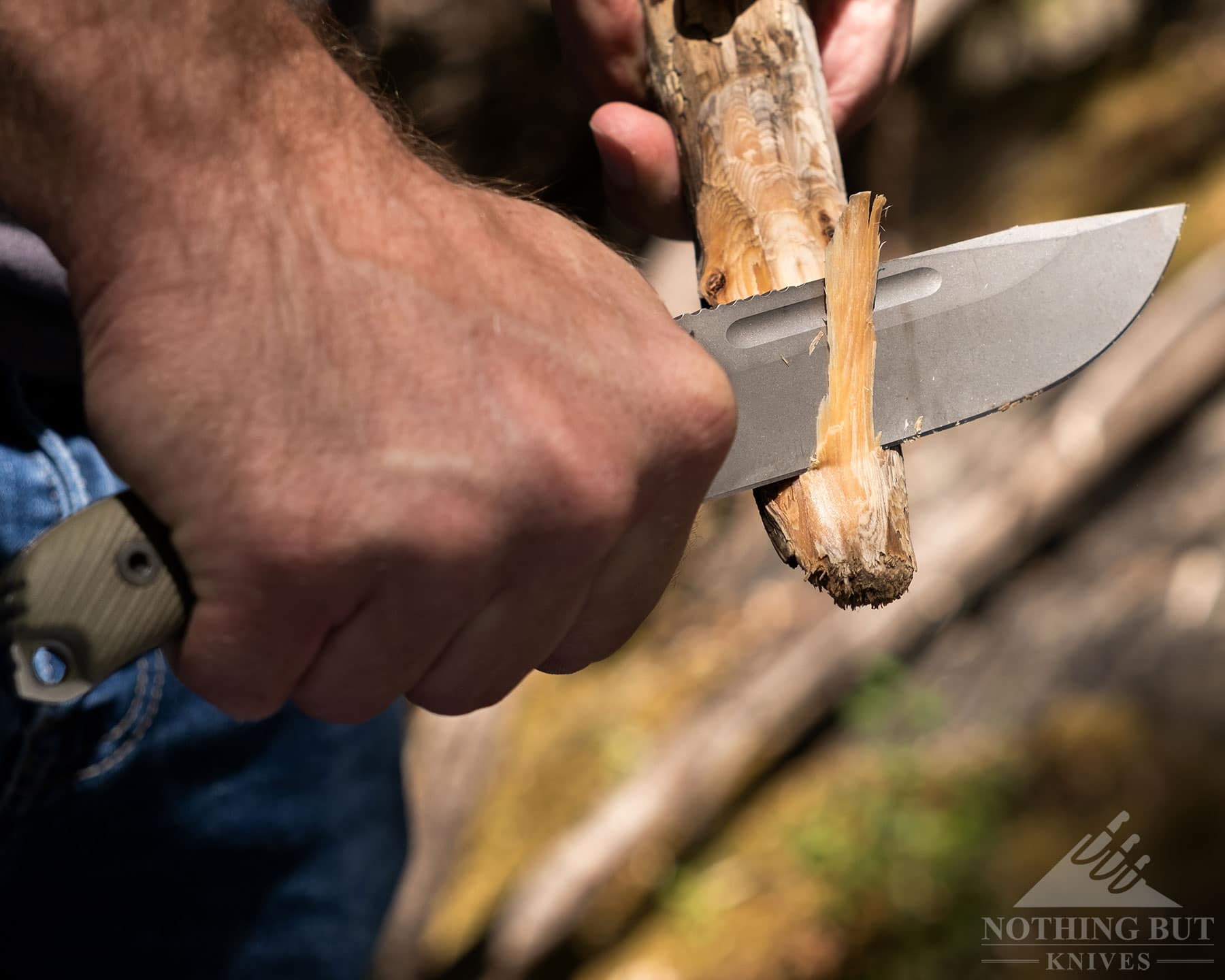 A side view of the Reiff Vicon being used to carve a stick. 