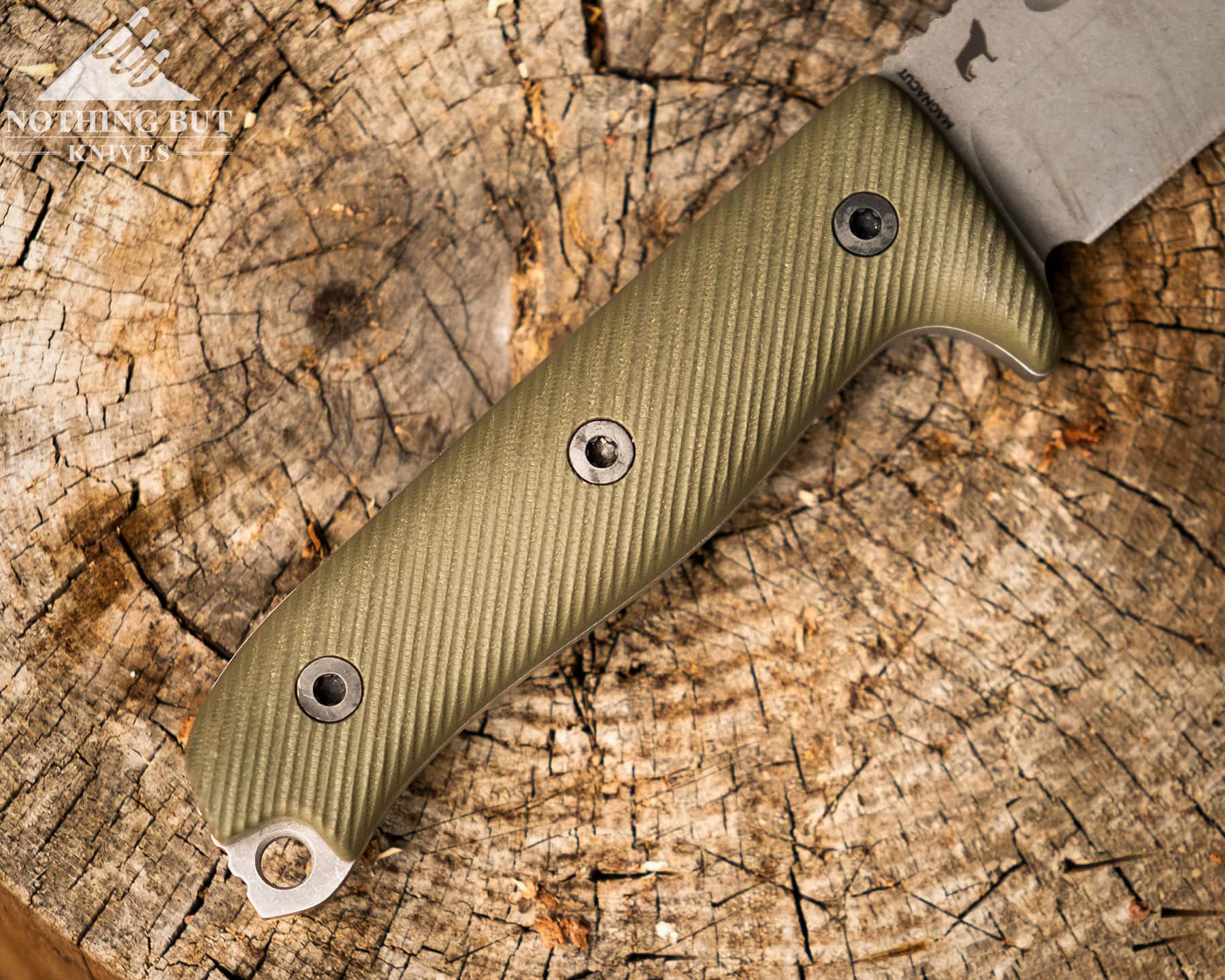 An overhead shot of the Reiff Vicon handle on top of a round of Pine.