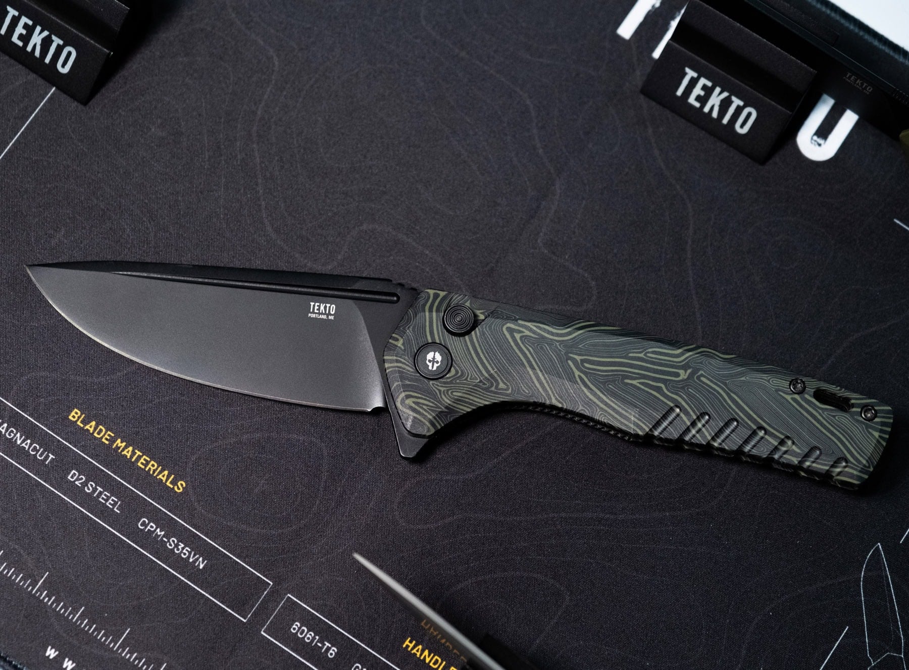 Blade Show West 2025 Wrap-Up - Image 4 The Tekto F3 Charlie folding knife with the open position on a black background.