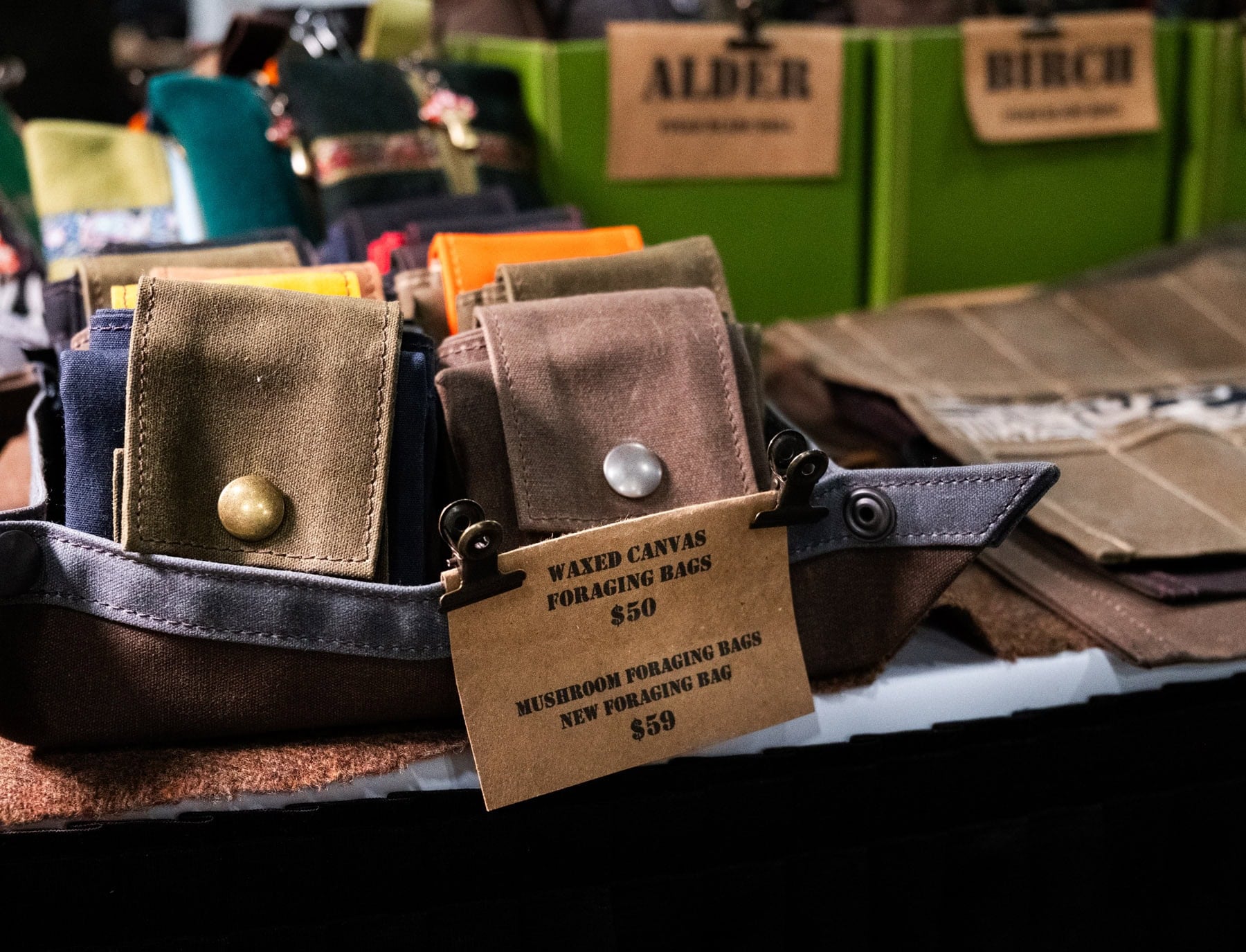 Blade Show West 2025 Wrap-Up - Image 10 Waxed canvas foraging bags by PNW Bushcraft.