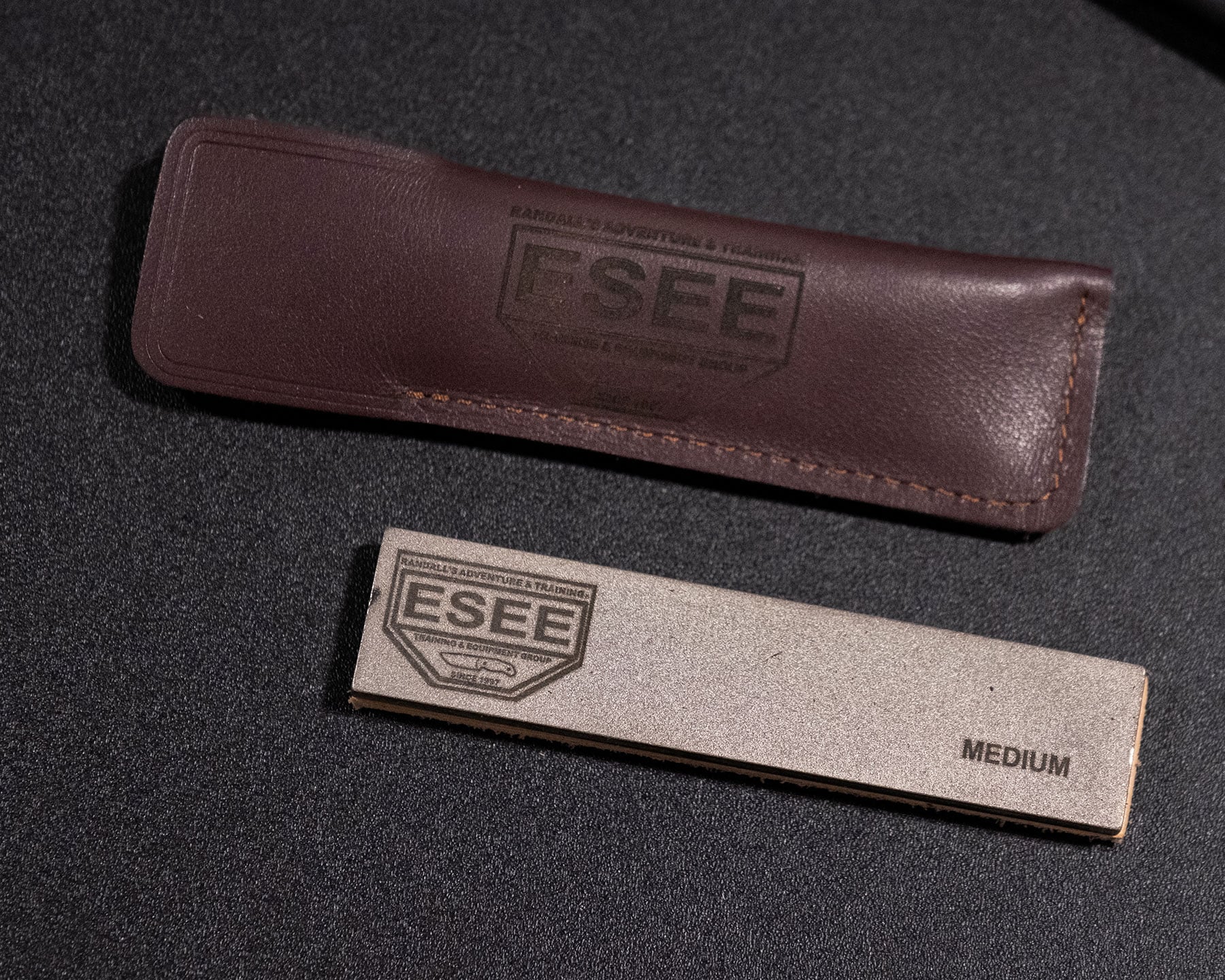 An overhead view of the Esee Knives two-sided pocket sharpener. 