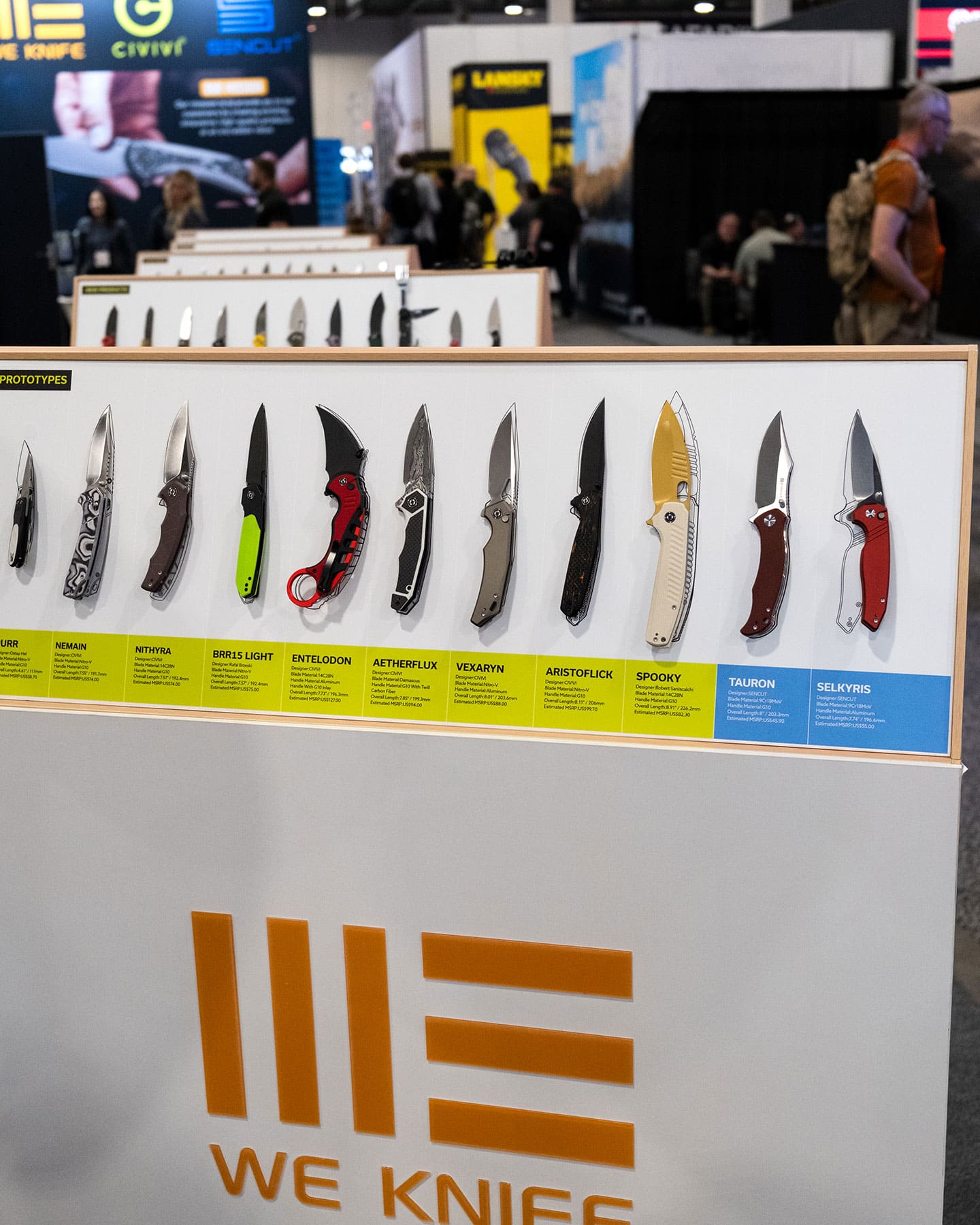 A display of new knife designs from WE Knives. 