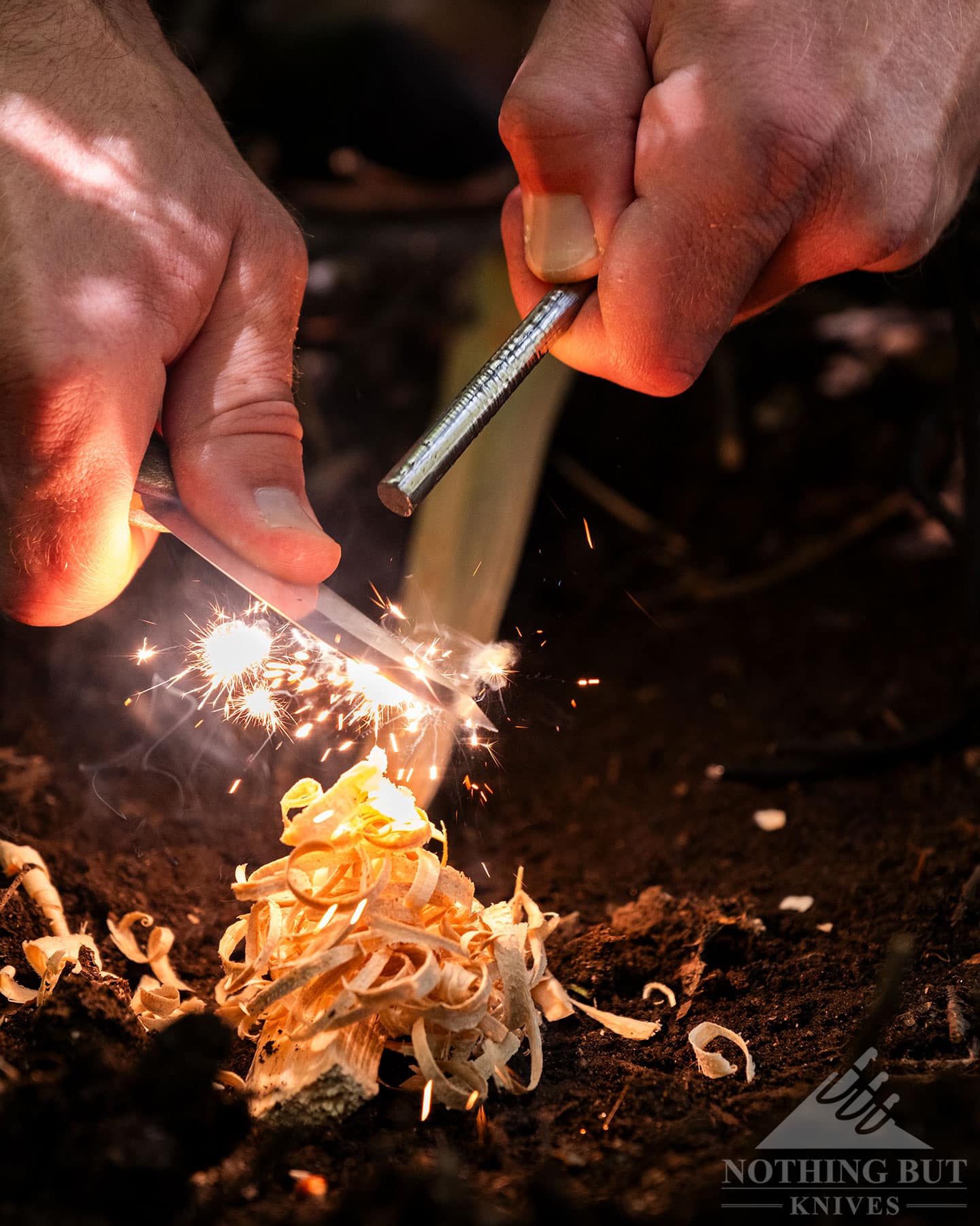 Knafs Lulu Review - Image 10 The Knafs Luly throwing spark into a small pile of wood shavings.
